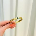 دستبند ال وی مشکی طلایی